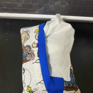 Peanut Gang Pocket Tissue Holder - This pocket tissue holder has a good bit of the Peanuts gang on it. #Peanuts #Snoopy #CharlieBrown