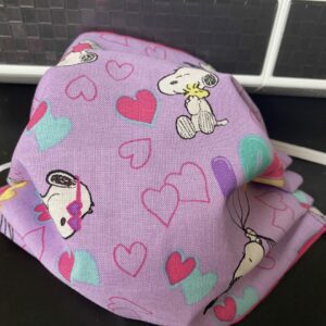 Snoopy Valentine Face Mask - The Valentine face mask has Snoopy and Woodstock with hearts and love balloons on it. #Snoopy #Woodstock #ValentinesDay