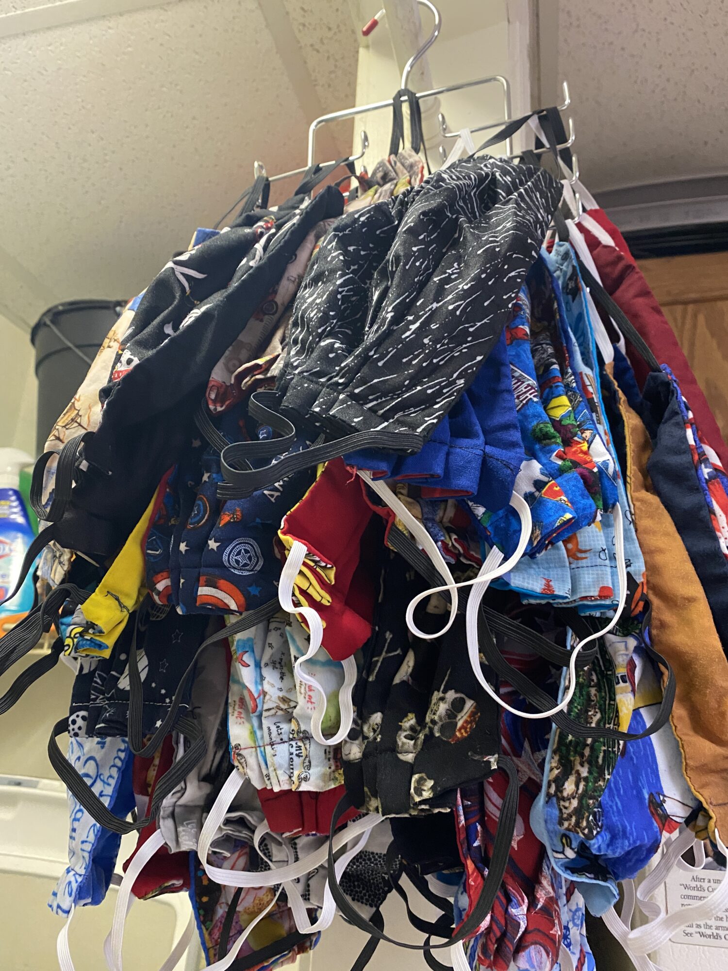 Air Dry Face Masks with a Tie Hanger - you can use a tie hanger to air dry your facemask that you hand washed.