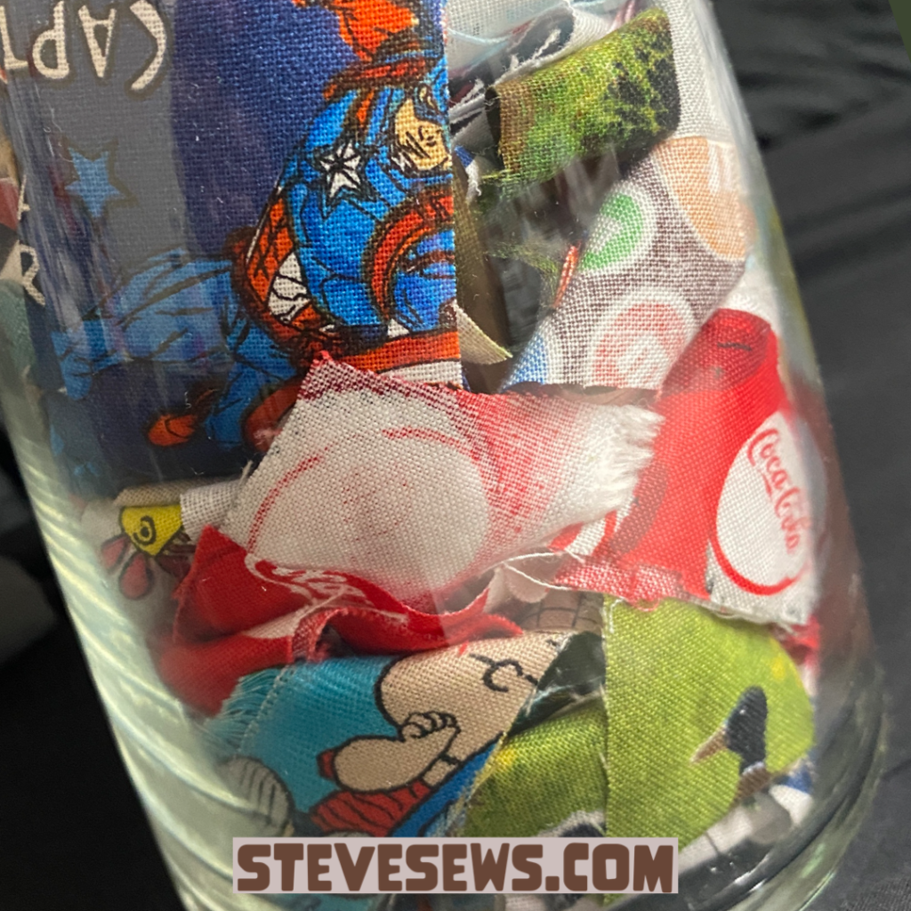 Scrap fabric vase this is one thing you can make with scrap strips of fabric and a vase. #ScrapFabric #Fabricvase