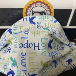 Faith, Hope and Love Face Mask - a white face mask with faith, hope and love on it in blues and greens. #Faith #Hope #Love