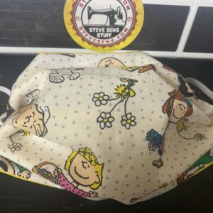 Peanuts Easter Face Mask - An Easter-themed face mask with the Peanuts gang. #Snoopy #Easter #CharlieBrown #Woodstock and more!