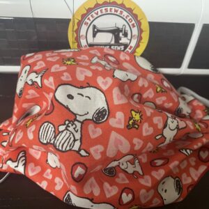 Hearts with Snoopy and Woodstock Face Mask - Here is a face mask with Snoopy and Woodstock and tons of hearts, great for Valentine's Day. #ValentinesDay #Snoopy #Woodstock