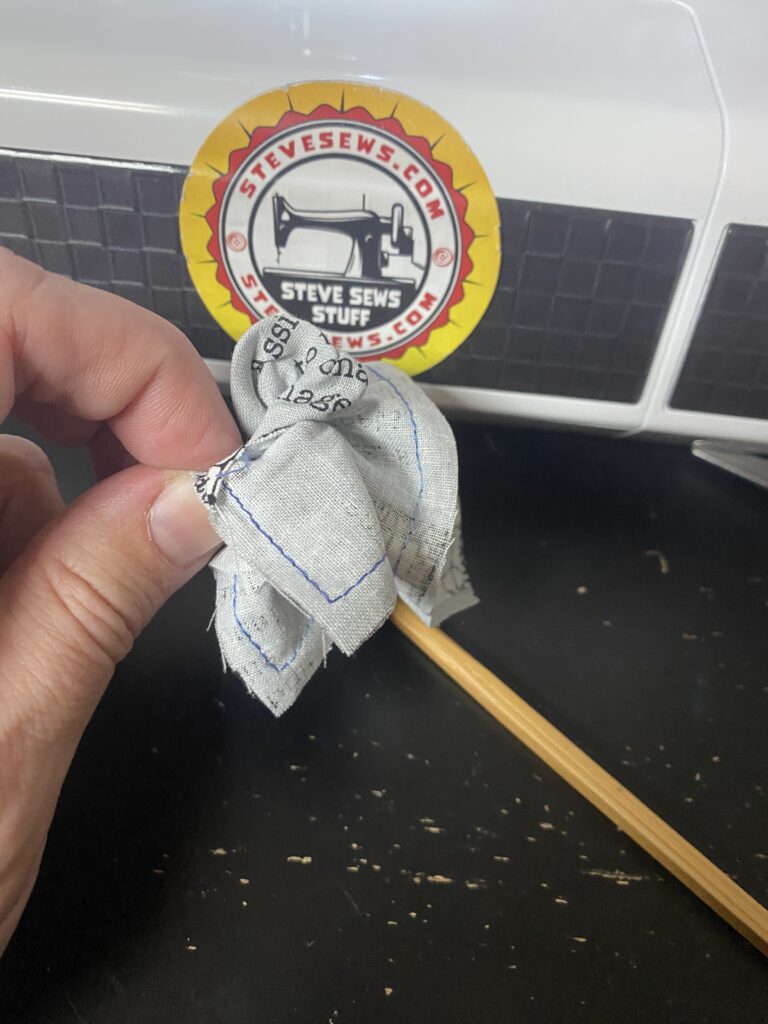 5. Turn out the square to show the right side of the fabric, a chop stick helps out a lot. 