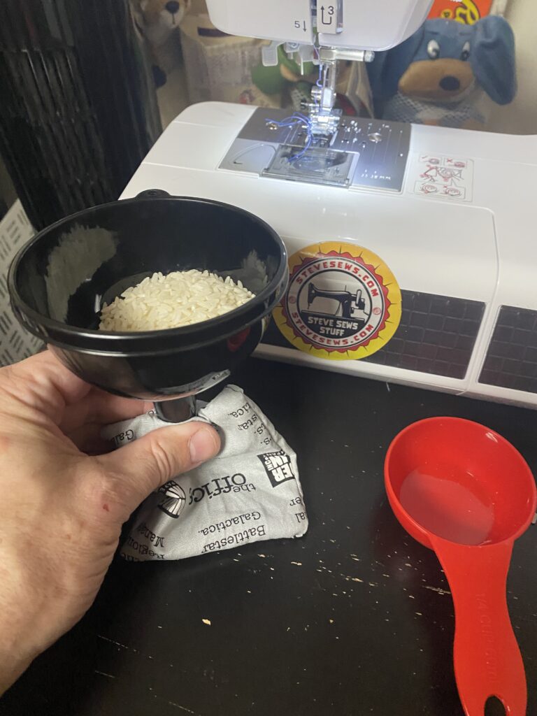 5. Fill the hand warmer with rice. 