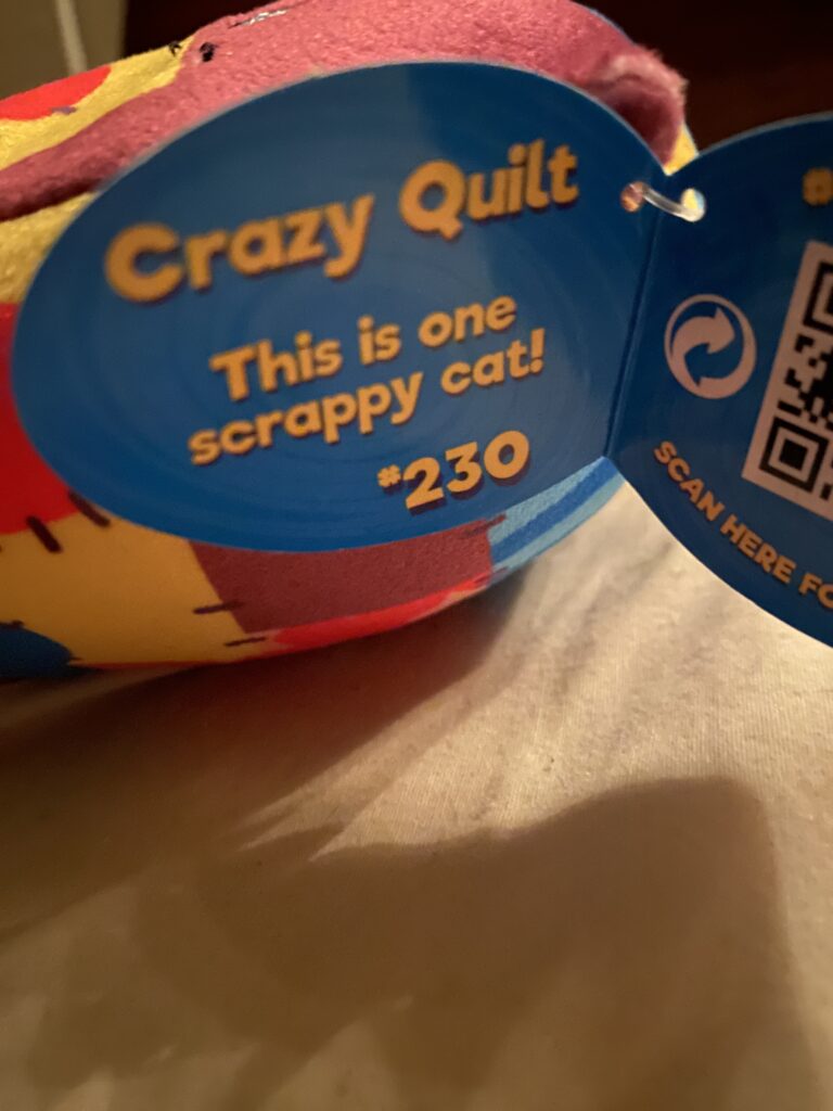 Crazy Quilt Cat (Cats vs Pickles) - here is a quilting related plush toy. #CatsVsPickles #CrazyQuilt #CrazyQuiltCat