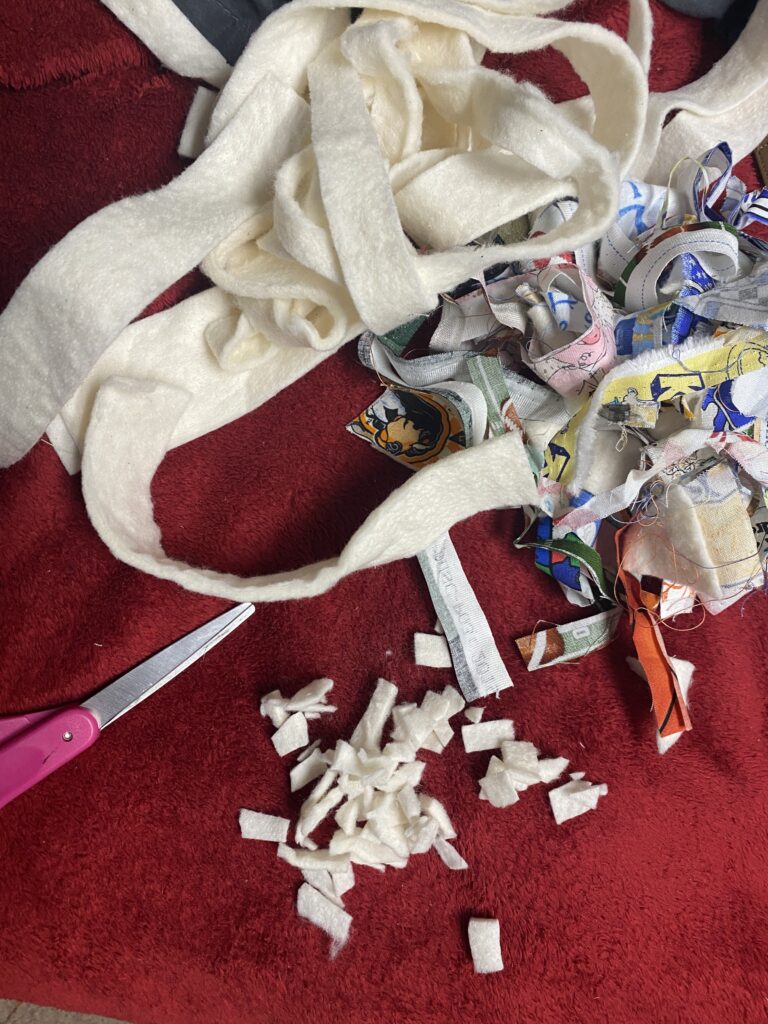 First, Cut up your scrap fabric and batting into diced pieces of fabric. ​