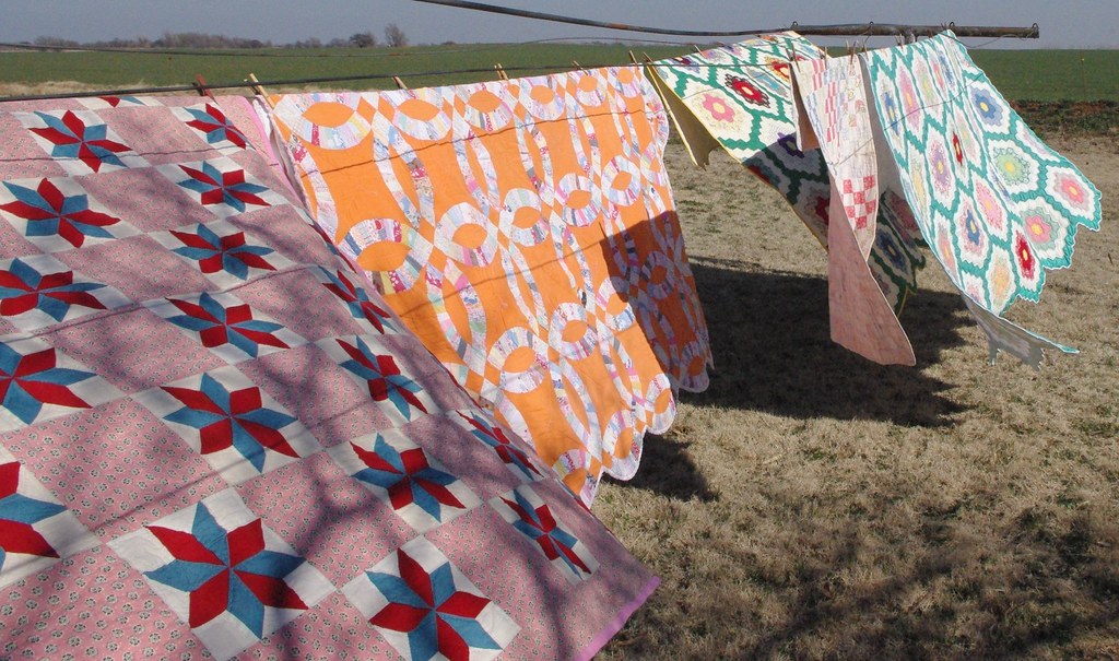 Utilize a Clothesline or Curtain Rod to Showcase Your Quilts - Quilts are not only practical items for warmth and comfort; they are also exquisite works of art. Many quilting enthusiasts pour their time, effort, and creativity into crafting beautiful quilts. Once completed, these masterpieces deserve to be displayed and admired. While traditional methods like using quilt racks or wall hangers are popular choices, another creative and visually appealing option is to hang your quilts using a clothesline or curtain rod. In this blog post, we will explore the benefits and steps involved in using these unconventional methods to showcase your quilts.