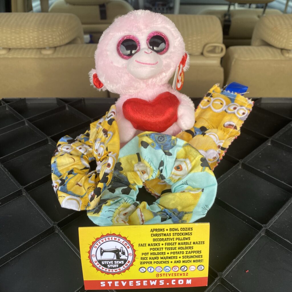 GiGi the Monkey likes the Minions because they like bananas like her. 

#gigi #monkey #banana #minions #tybeanieboos 
She showing off some Minions items scrunchies and a bookmark 
SteveSews.com/?s=minions
