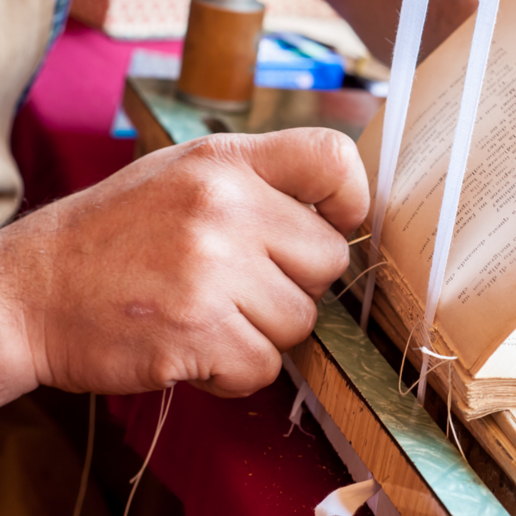Sewing in Case Binding in the Printing Industry — In bookmaking, the term "case binding" often conjures images of stately hardcover books, their spines lined up on library shelves, exuding a sense of permanence and tradition. But what many may not realize is the intricate process of sewing that lies at the heart of this bookbinding method—a process that not only holds the pages together but also connects us to a centuries-old craft.